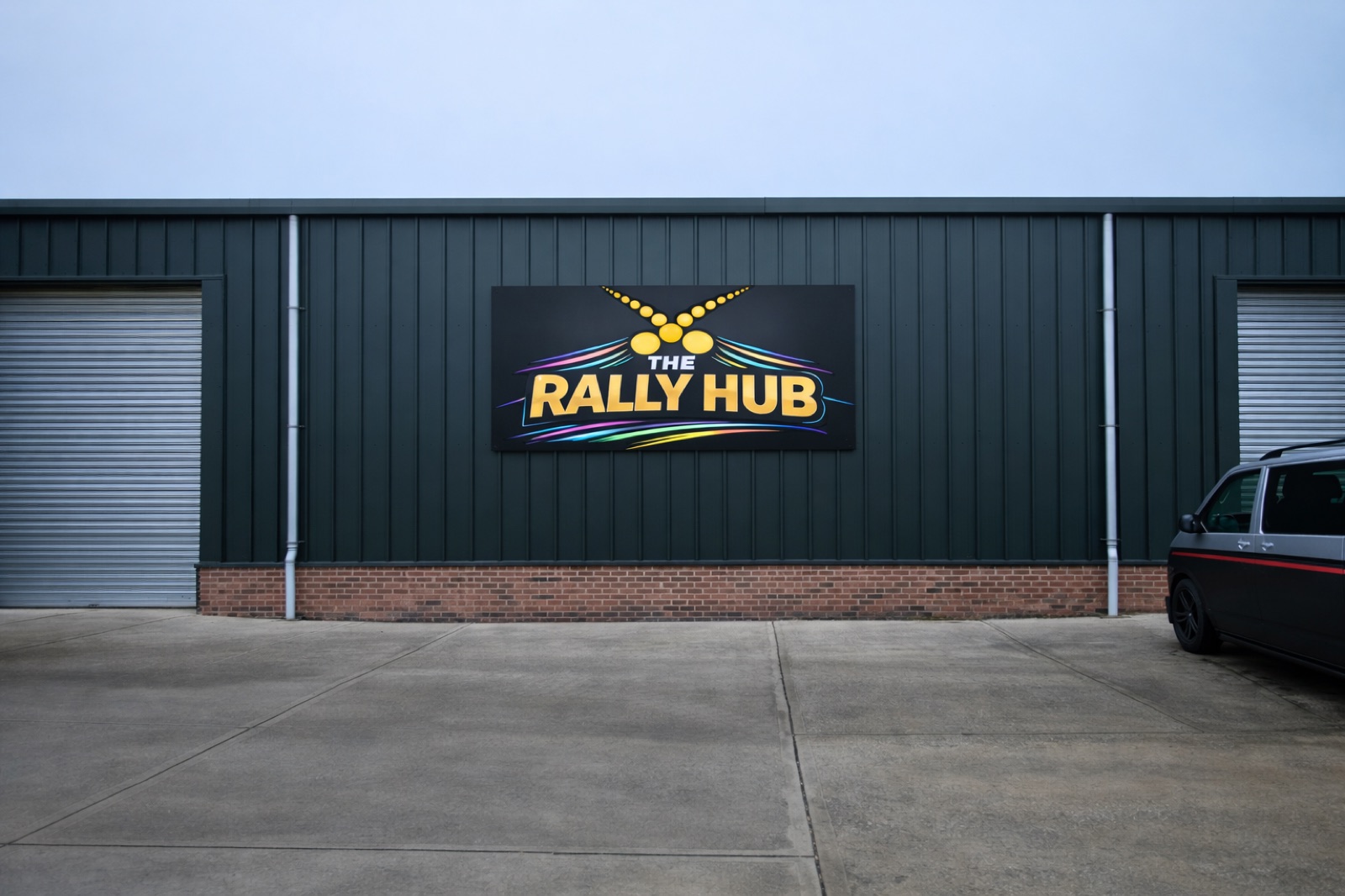 The Rally Hub’s dark green unit at Beeby Fields, with its yellow signage above the entrance